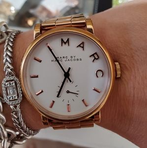 Marc Jacobs.  Gold with white face.